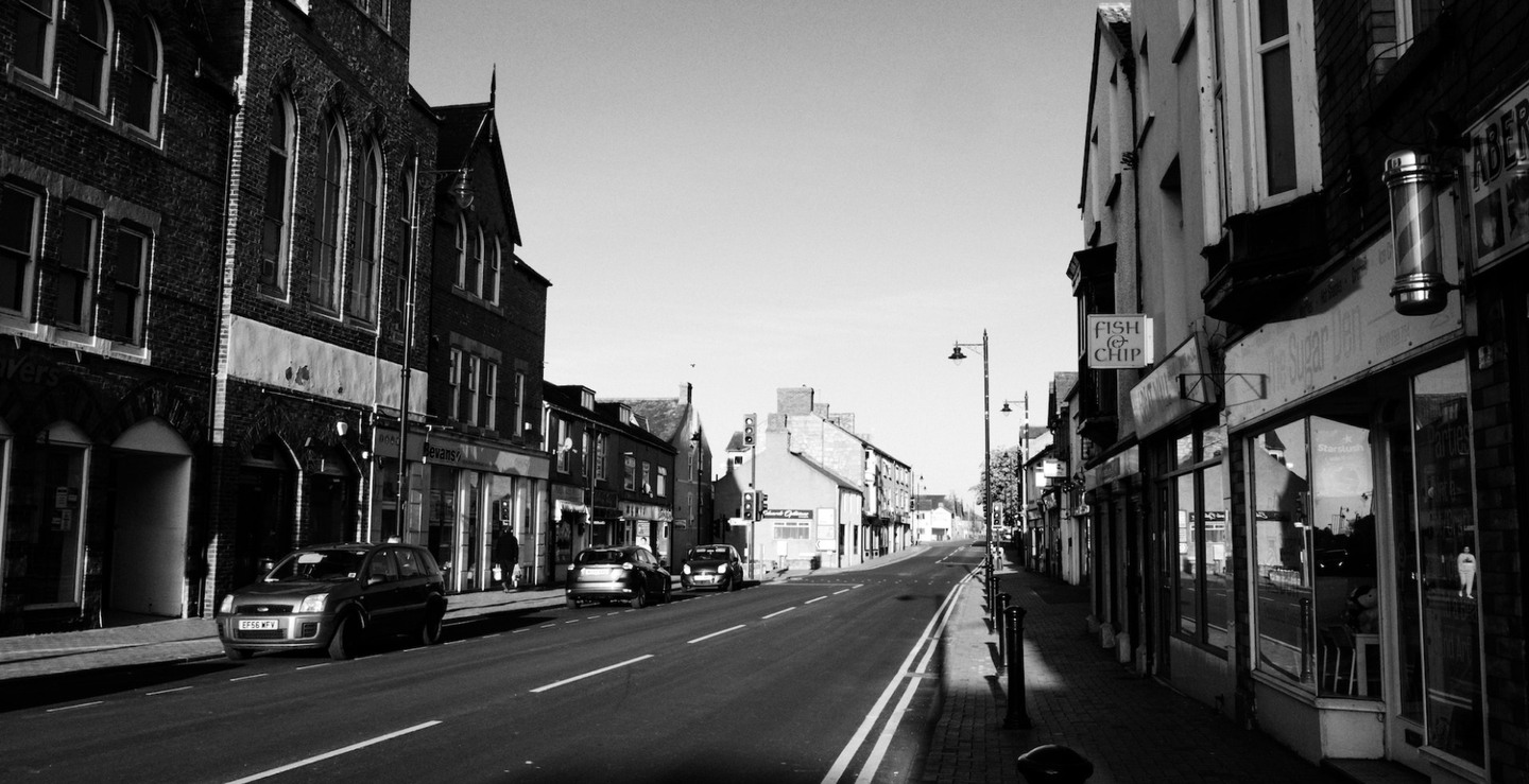 UK high street shot in black and white